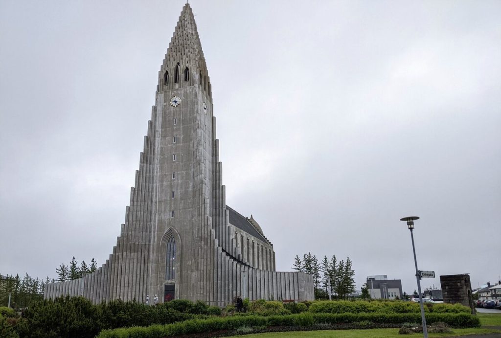 The pipe organ-inspired facade of Iceland's Hallgrímskirkja cathedral against a stormy gray sky